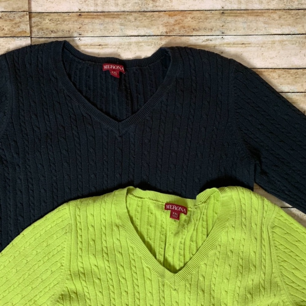 Pair of cable knit sweaters